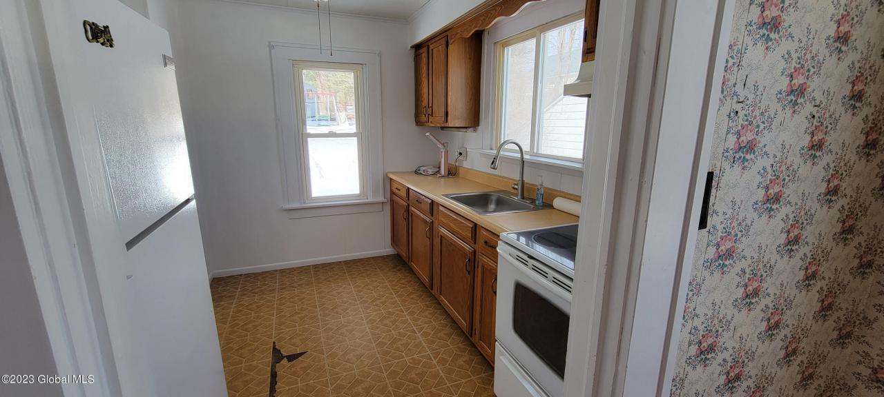 Wooster St, Gloversville, NY 12078