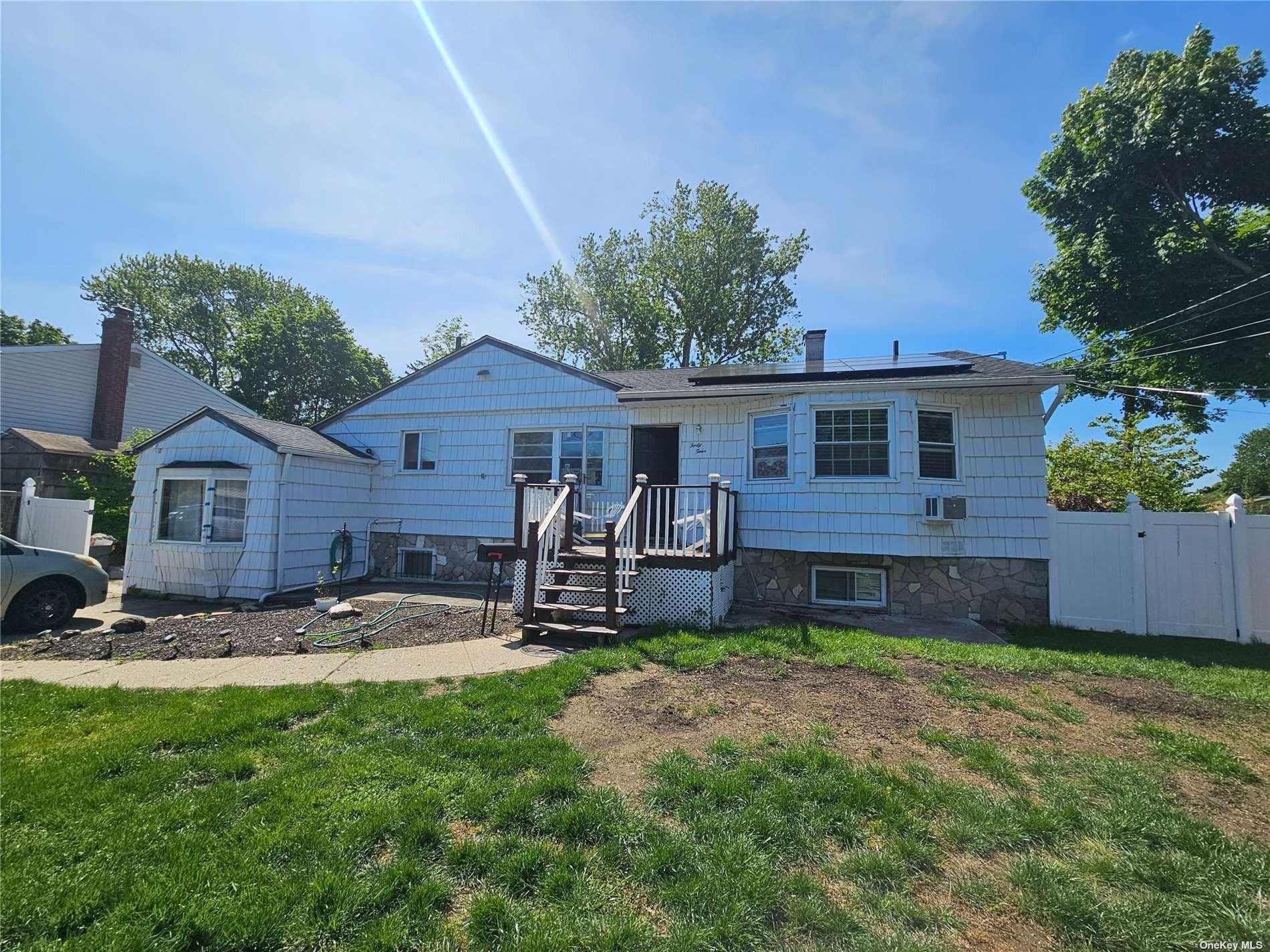 Juniper St, Central Islip, NY 11722