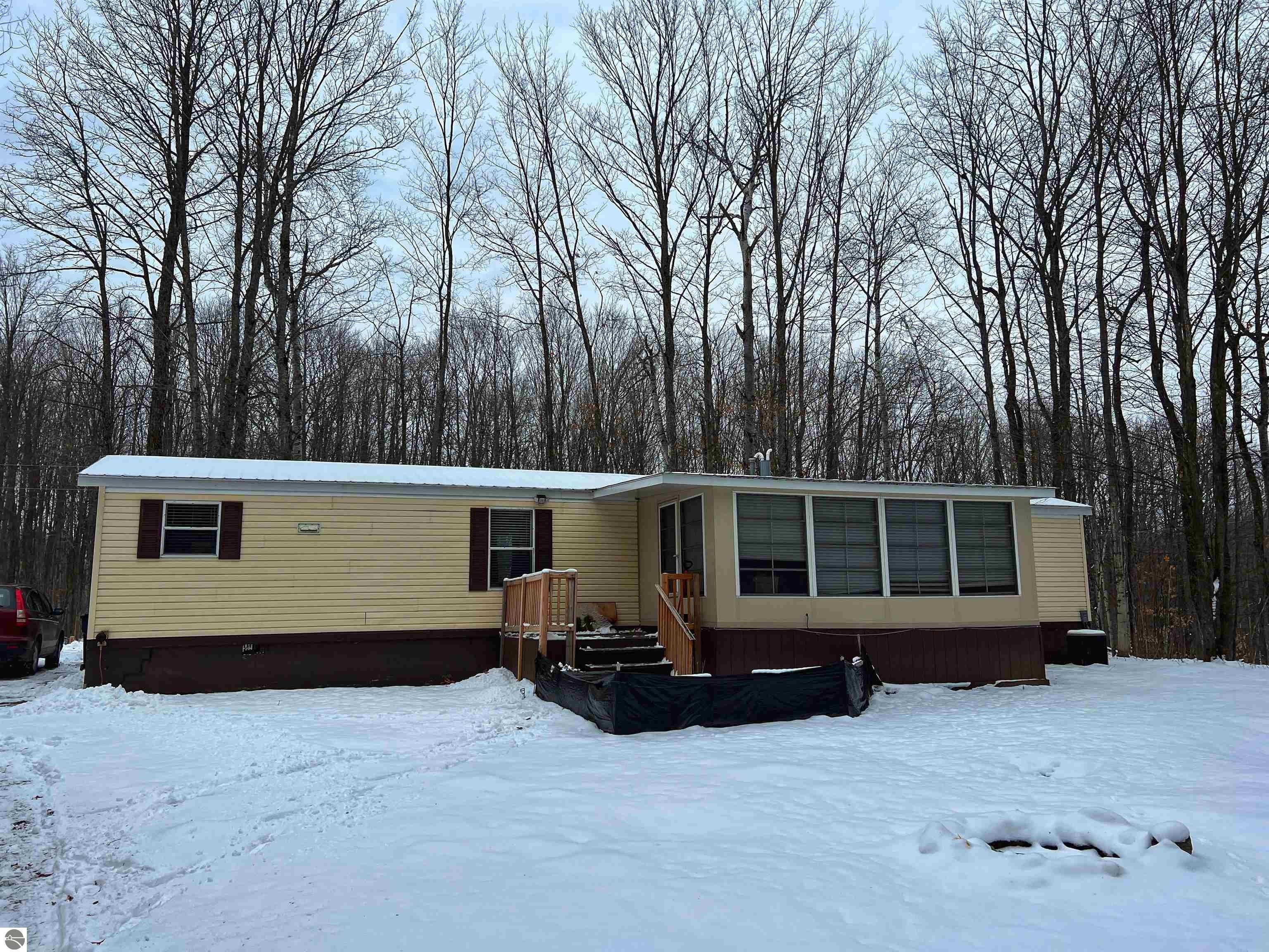 Springside Dr, Mancelona, MI 49659