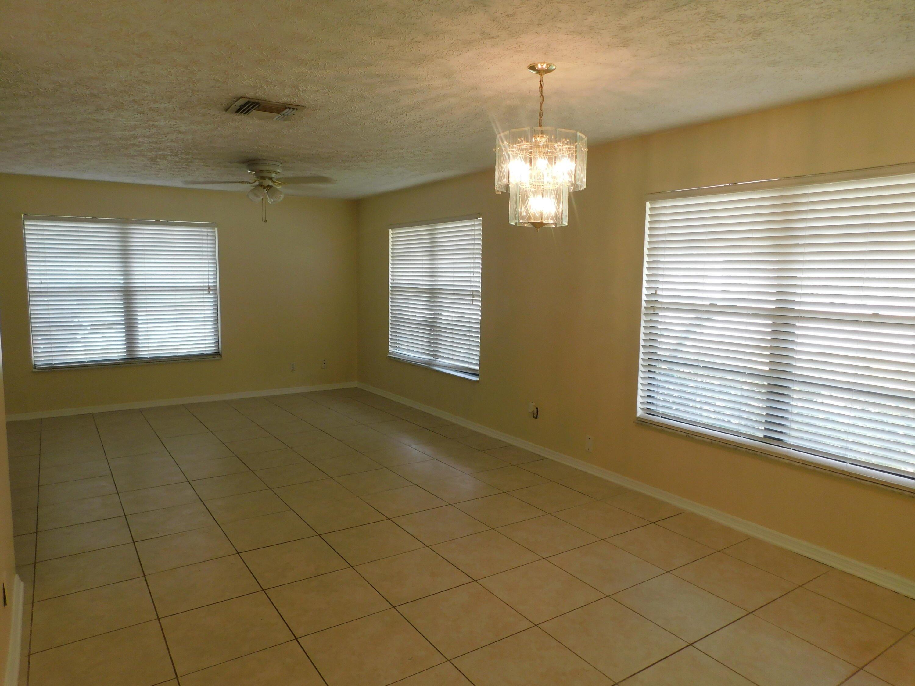 Se Petunia Ave, Port Saint Lucie, FL 34952
