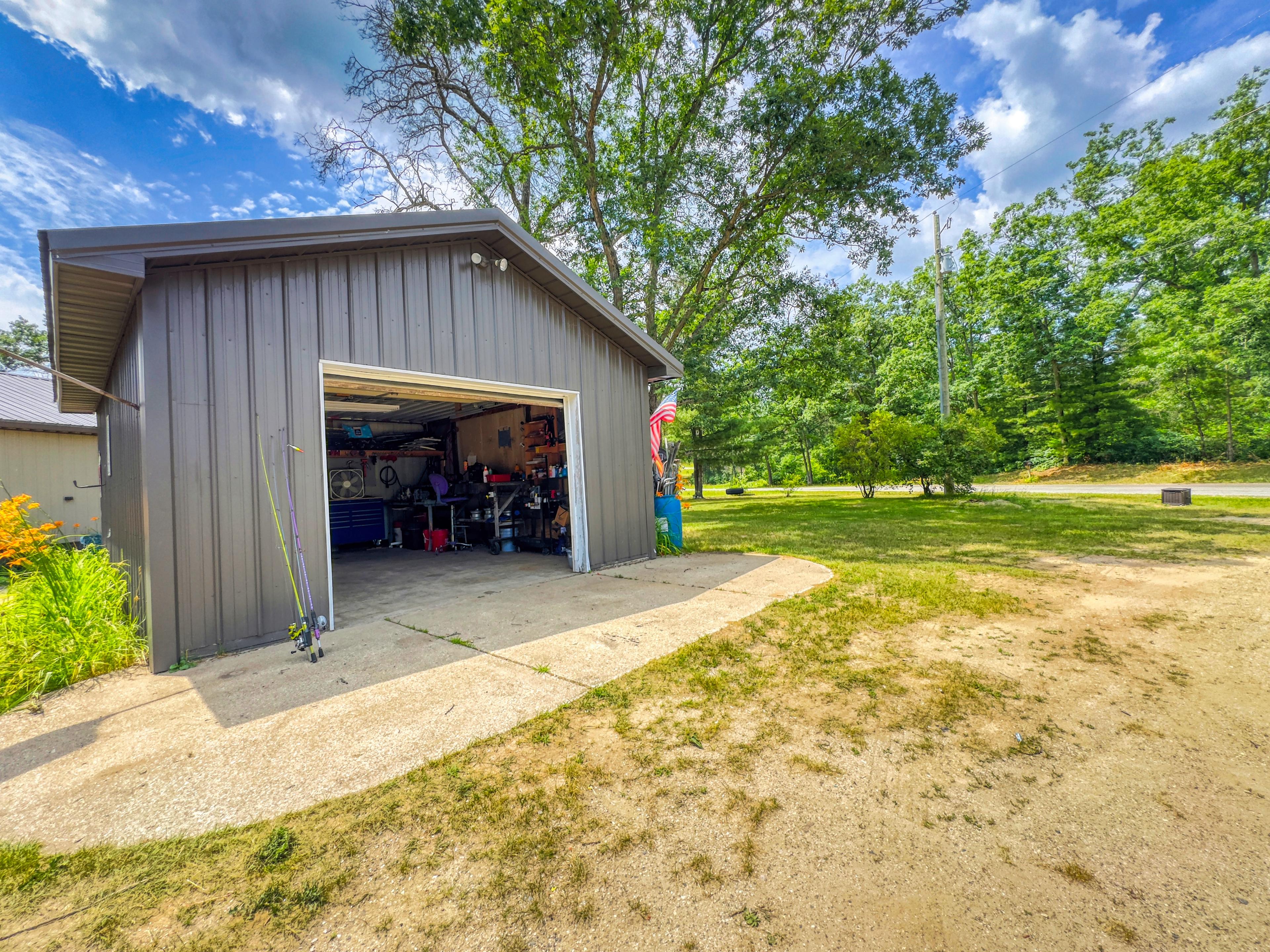 E 3 Mile Rd, Luther, MI 49656