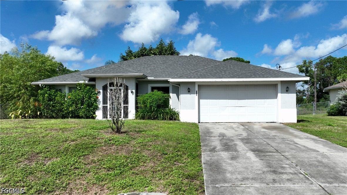 Empire Ave S, Lehigh Acres, FL 33974