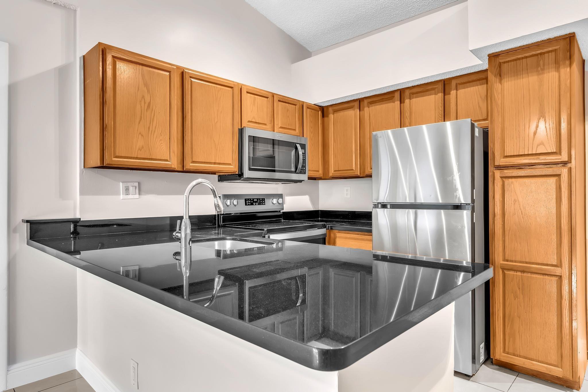 Lyons Rd, Coconut Creek, FL 33063