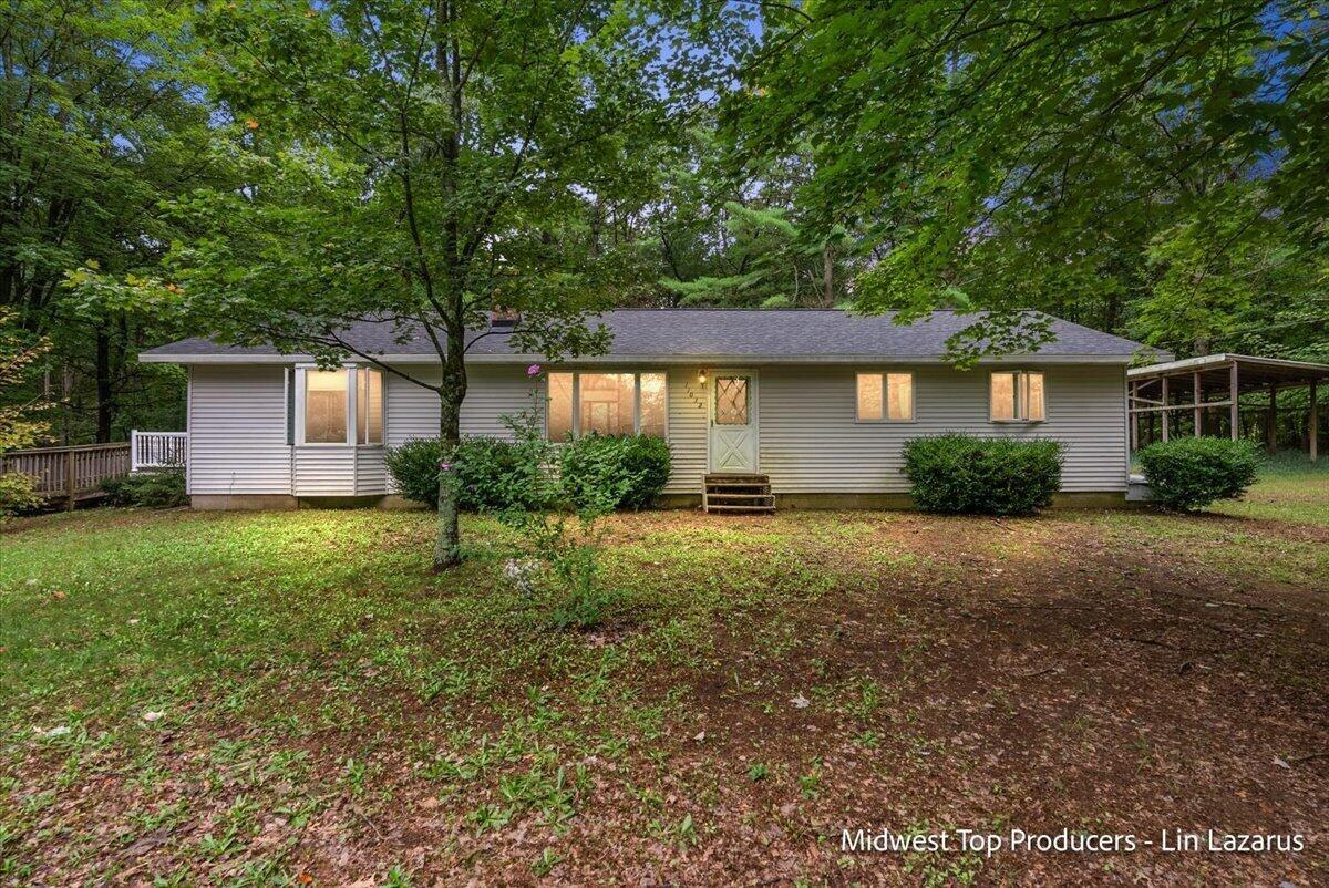 Evergreen St, Holton, MI 49425