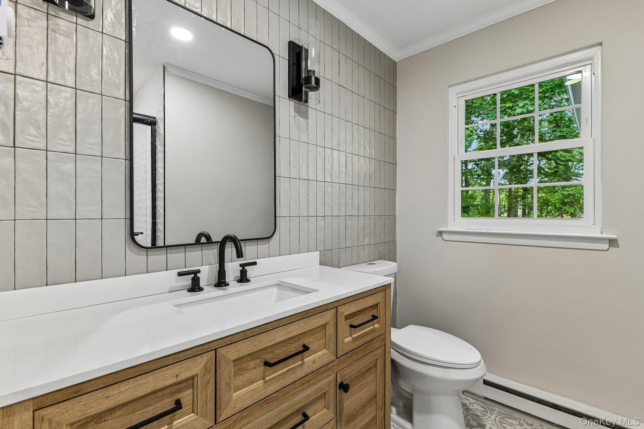 Canterbury Dr, Ridge, NY 11961