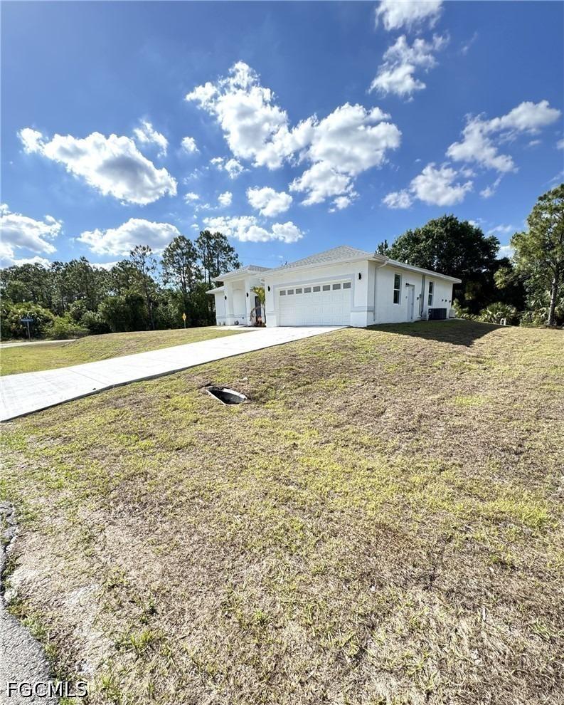 W 7th St, Lehigh Acres, FL 33972