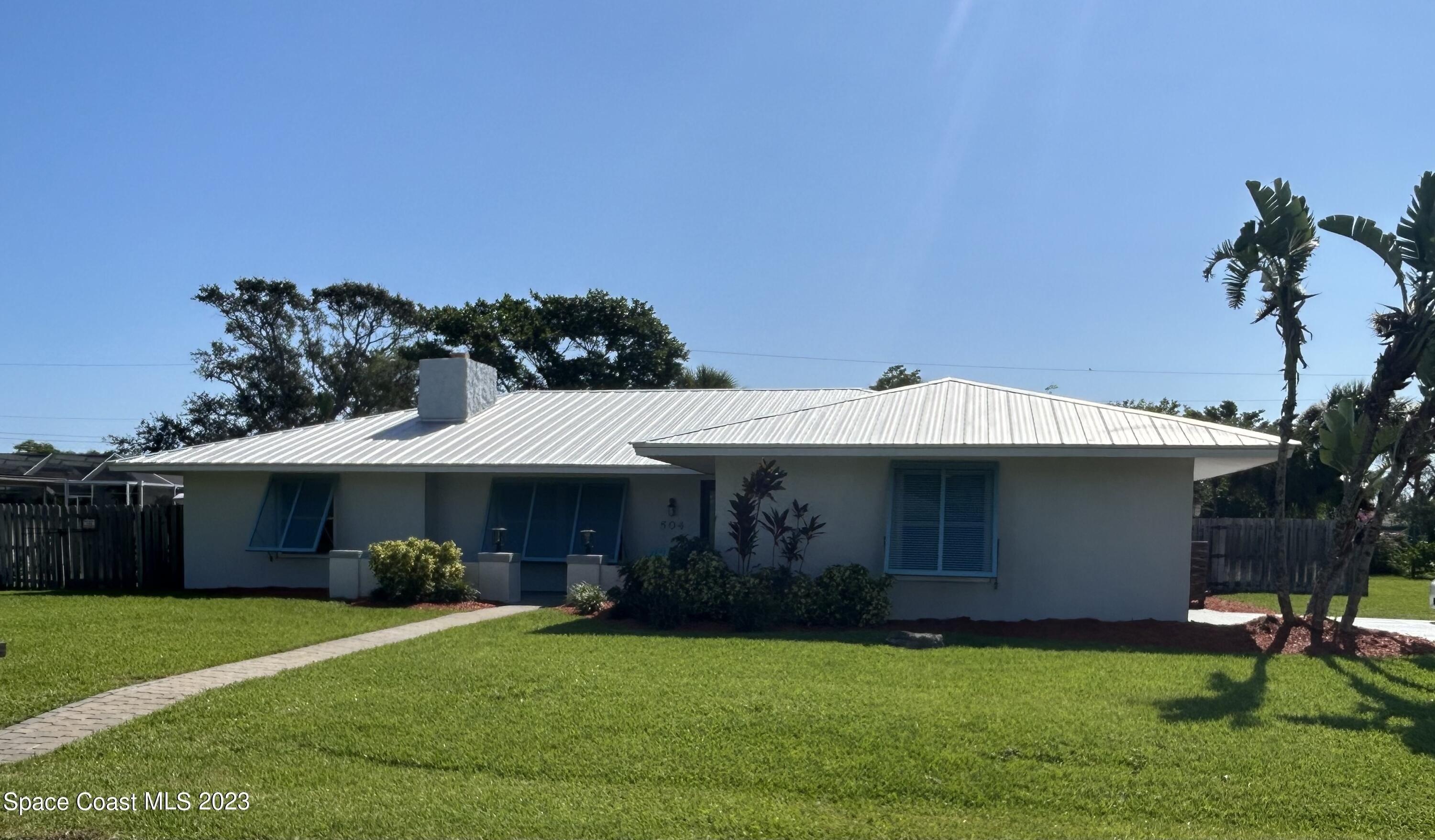 Latania Palm Dr, Indialantic, FL 32903