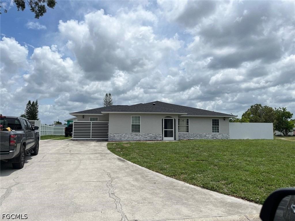 Caywood Cir N, Lehigh Acres, FL 33936